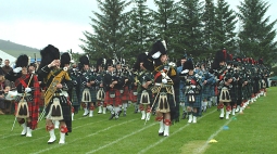 Massed Pipe Bands at the Dufftown Scottish Highland Games, Dufftown, Moray, Scotland, UK.